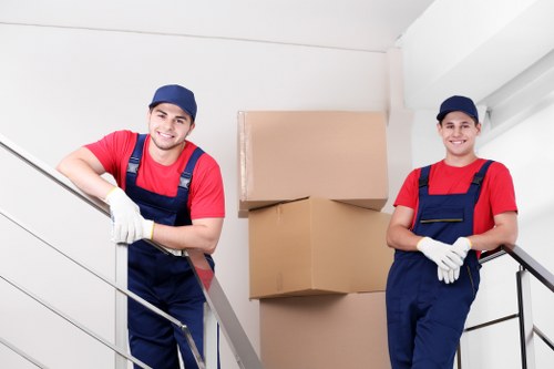 Movers unpacking boxes in a new home